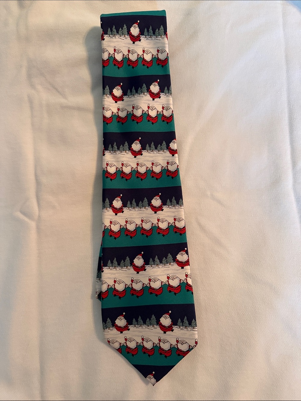 Festive Santa Pattern Holiday Tie in Teal and Navy 100% silk